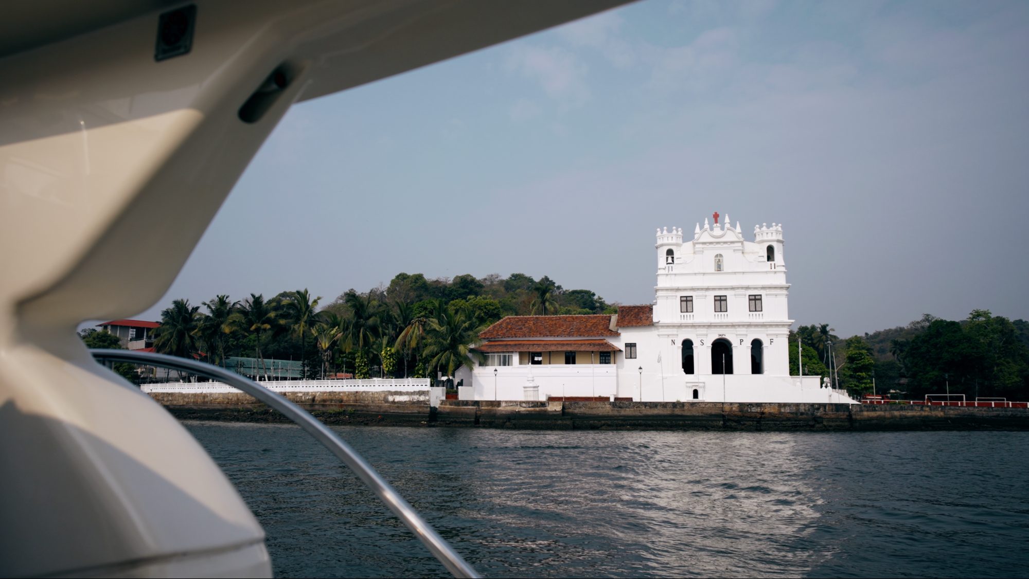 the Old Goa churches from the river at dusk